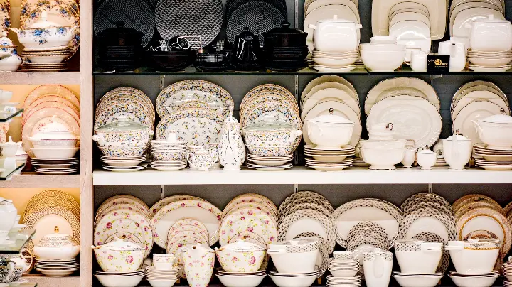 white ceramic bowl on shelf