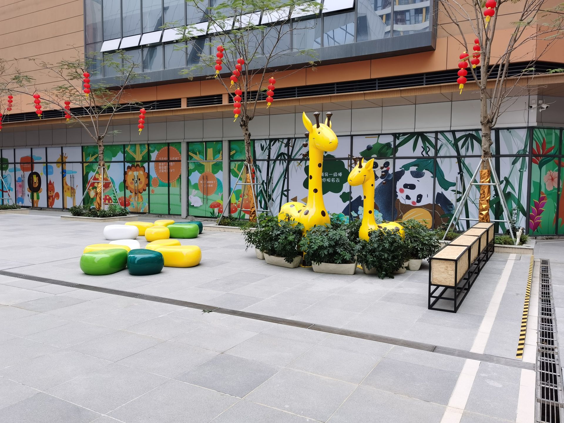 Fiberglass furniture in front of a mall