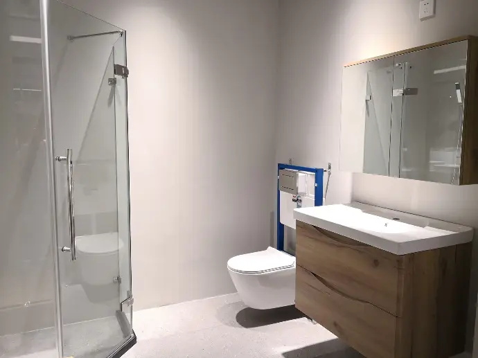 A clean bathroom arranged for optimal functionality