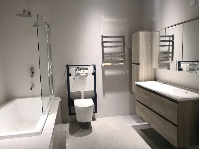  A contemporary bathroom with gleaming porcelain fixtures