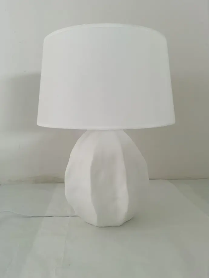 A white table lamp